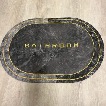 Alfombra para baño ovala de goma estampada simil marmol de 60 x 40 cm
