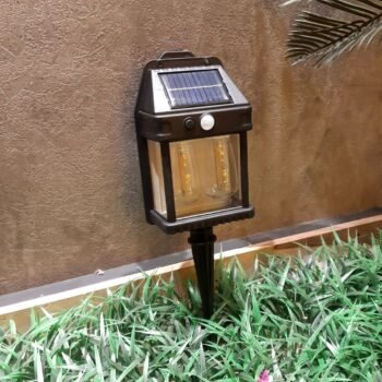 Lampara solar con 2 focos led y sensor de movimiento con aplique y estaca