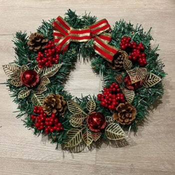 Adorno corona colgante hojas verdes y doradas con moños y detalles en rojo de 30 cm