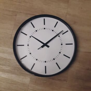 Reloj moderno de pared negro lineas y puntos de 35 cm