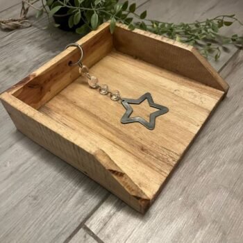 Servilletero de madera con estrella de metal de apoyo