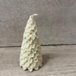 vela pinito con hojas