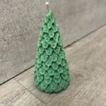 vela pinito con hojas