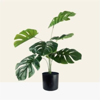 Planta con hojas estilo monstera artificiales de 45 cm en maceta negra
