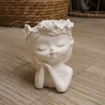 maceta nena soñadora