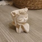 maceta nena soñadora