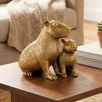 Adorno carpinchos dorados de 18 cm