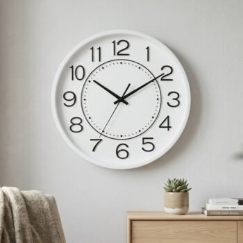 Reloj de pared blanco y negro con numeros de 25 cm