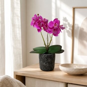 Planta artificial de orquideas fucsia de 26 cm en maceta de cemento