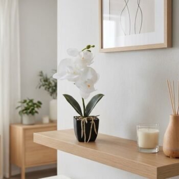 Planta artificial de orquideas blancas en maceta negra de 27 cm